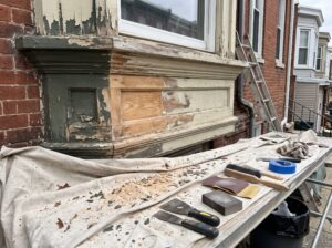 Exterior wood paint preparation detail for residential work in Philadelphia.